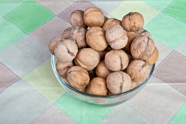 Walnuts in a glass dish — Stock Photo, Image
