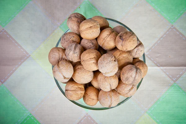 Walnuts in a glass dish — Stock Photo, Image