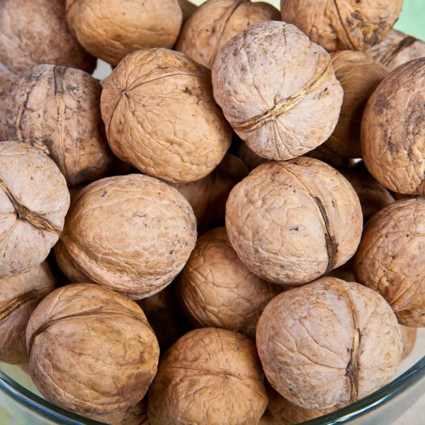 Walnuts in a wicker basket — Stock Photo, Image