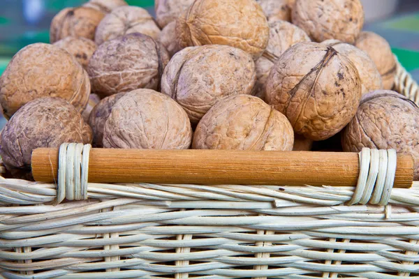 Walnuts in a wicker basket — Stock Photo, Image