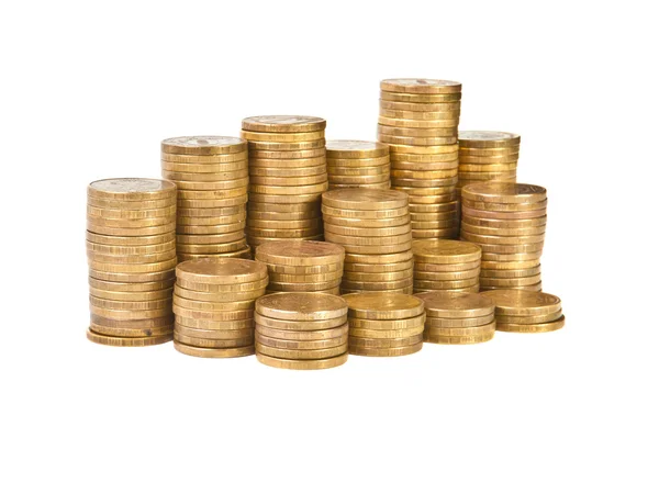 Montones de monedas sobre fondo blanco — Foto de Stock