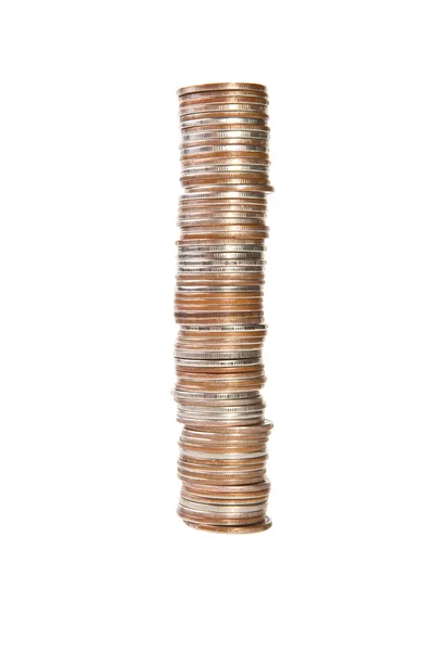 Montón alto de monedas sobre fondo blanco —  Fotos de Stock