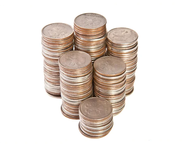 Montones de monedas sobre fondo blanco —  Fotos de Stock