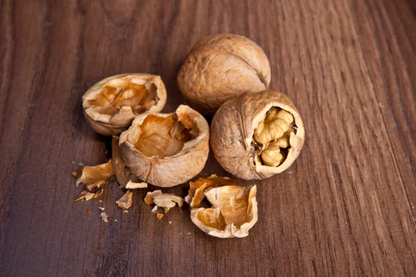 Walnuts on a wooden background — Stock Photo, Image