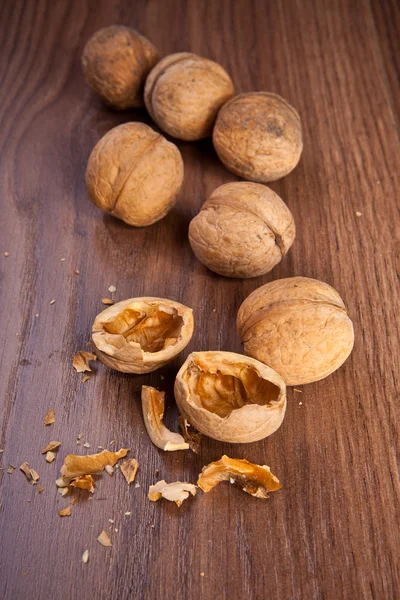 Walnuts on a wooden background — Stock Photo, Image