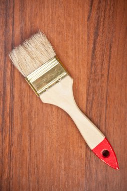 ahşap arka plan üzerinde boya fırçası
