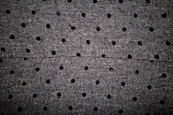 Gray material with black circles background — Stock Photo, Image