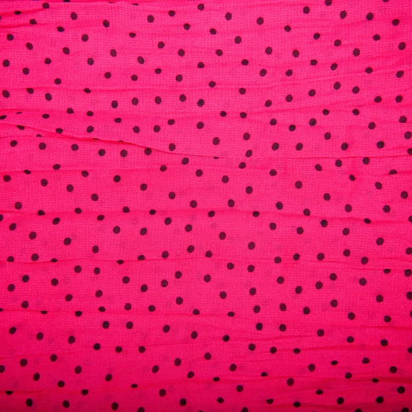 Red textile background with black circles — Stock Photo, Image