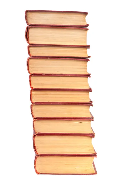 Pilha de livros antigos com páginas amareladas sobre fundo branco — Fotografia de Stock