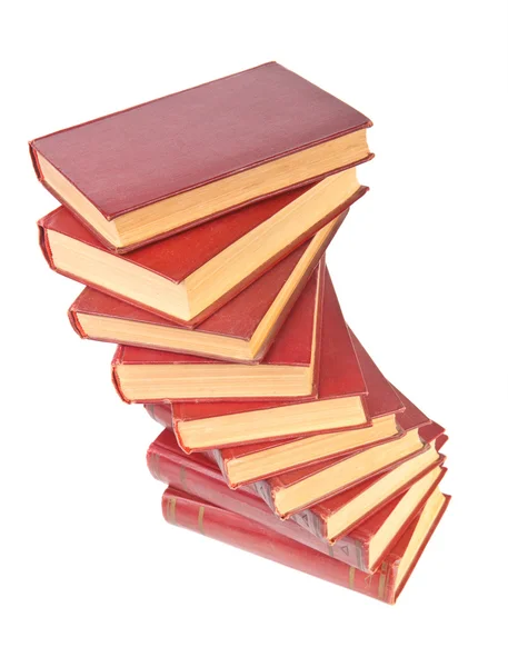 Stack of old books with yellowed pages on white background — Stock Photo, Image