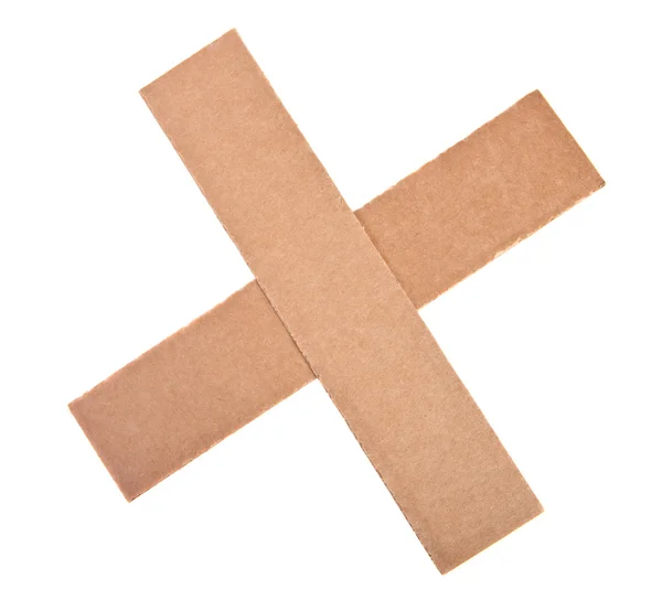 Крест из двух картонных полос — стоковое фото