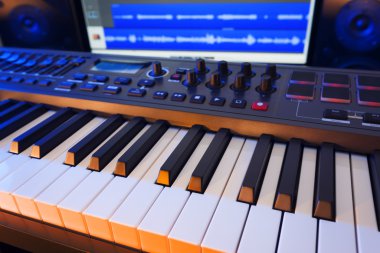 Keyboard in Home Music Studio clipart
