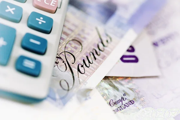 British currency and calculator — Stock Photo, Image