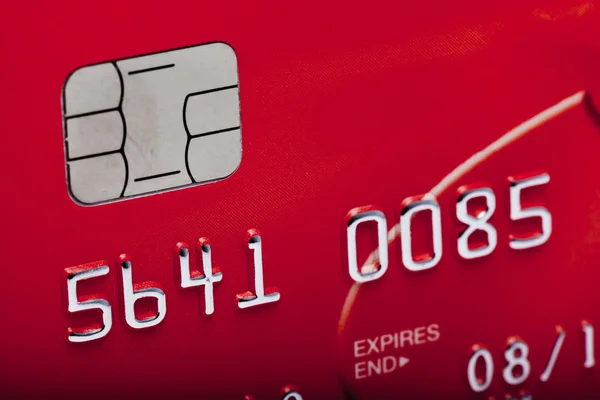 Close-up de cartão de crédito vermelho — Fotografia de Stock