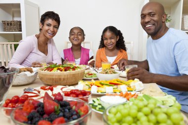 African American Parents Children Family Eating At Dining Table clipart