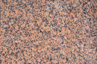 Yaklaş, doğal koyu kırmızı granit mermer dokusu.
