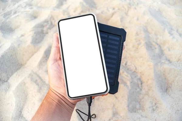 Close Mock Smartphone Charger Power Bank Man Hand Backdrop Sandy — Stock Photo, Image