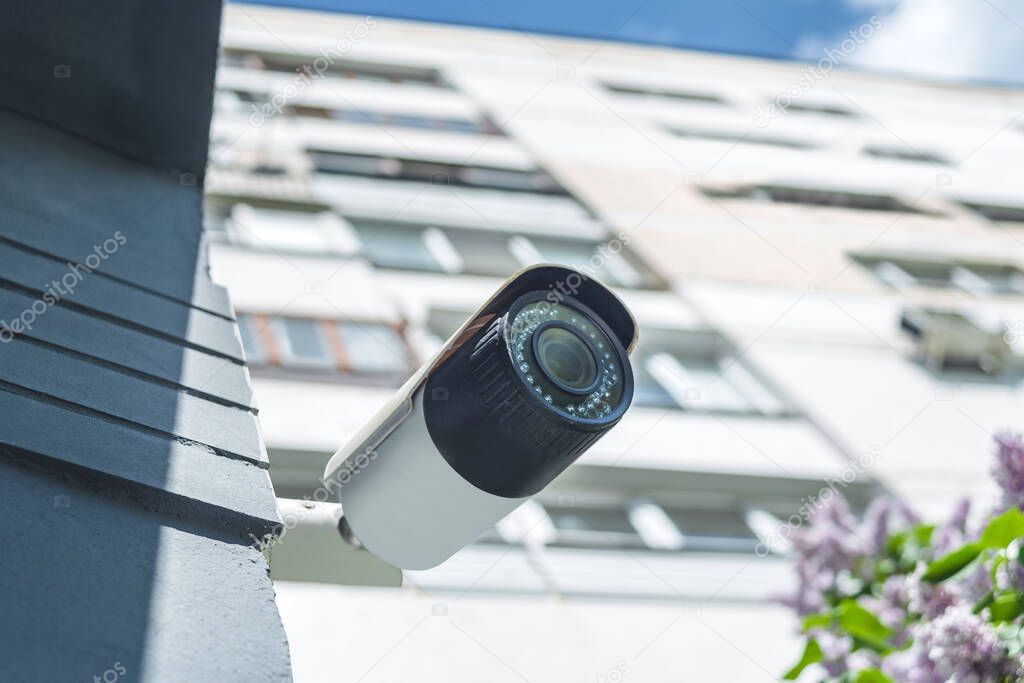 Close-up, CCTV camera on a multi-storey building