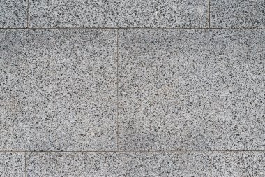 Yakın plan. Doğal gri granit maddenin yüzey dokusu ve mineral taşı. Soyut Arkaplan Boş Dikensiz. Yukarıdan görüntüle