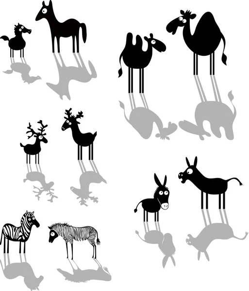 Set of black animal silhouettes — Stock Vector