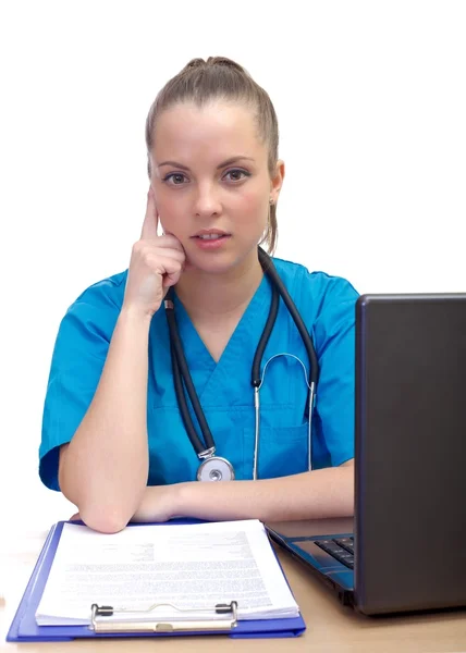 Thinking female doctor — Stock Photo, Image