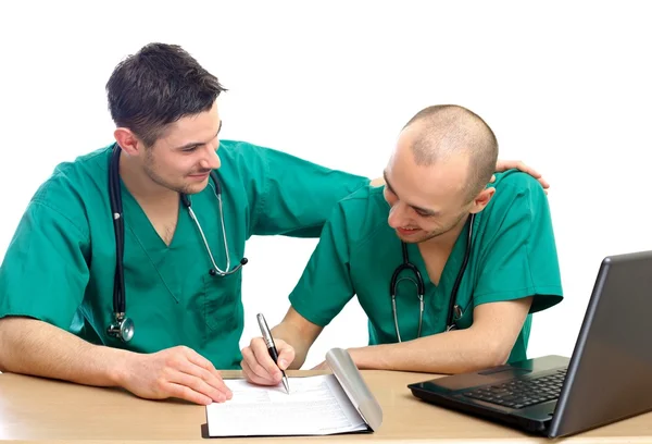 Doctors at office — Stockfoto