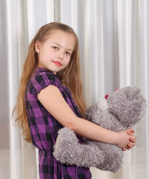 Girl with teddy bear — Stock Photo, Image