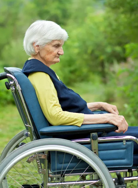 Unhappy elderly woman — Stock Photo, Image