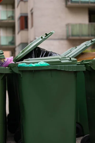 Close up picture of trash bin full of garbage on the streets of Budapest, downtown