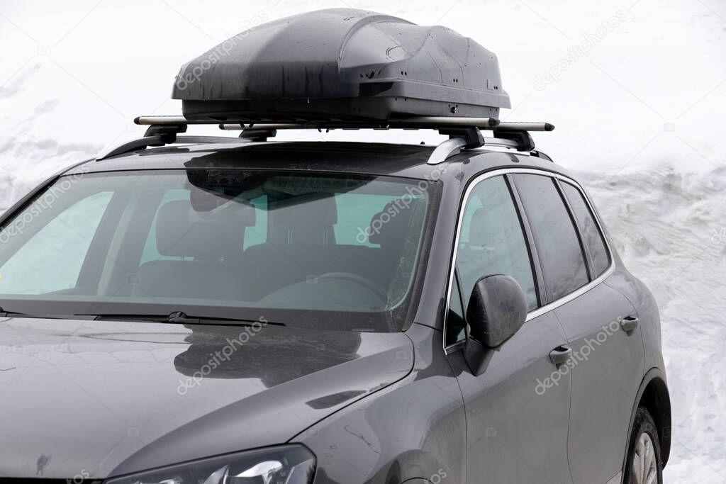 Photo of a modern car with a roof rack