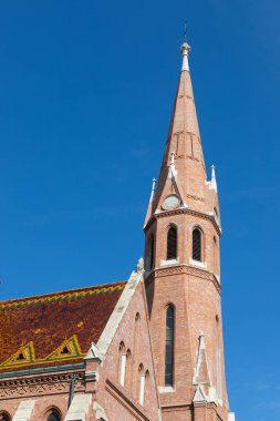 Picture of a roman catholic church and the bell tower in Hungary