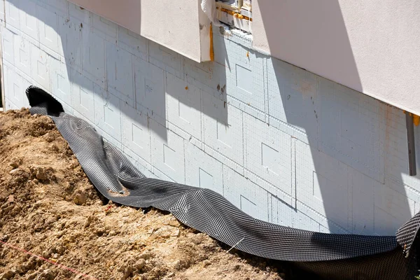 House foundation insulation details with waterproofing membrane