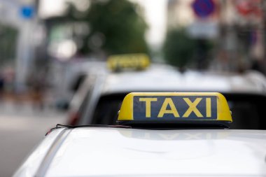 Close up picture of a taxi sign 