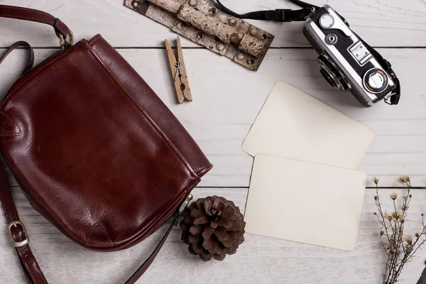 Retro leather bag and photo — Stock Photo, Image