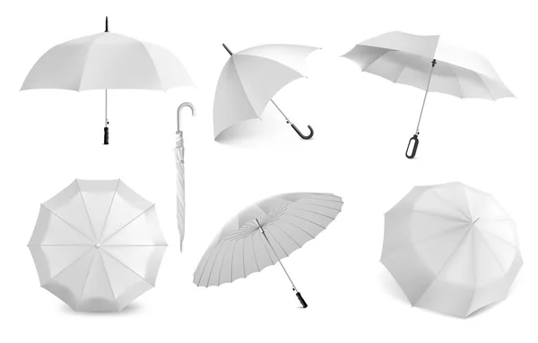Realistische witte paraplu. Parasol model voor branding. Uitzicht vanuit verschillende hoeken op open en gesloten waterdichte luifel. 3D vouwtent met handvat. Vector regenbescherming accessoires set — Stockvector