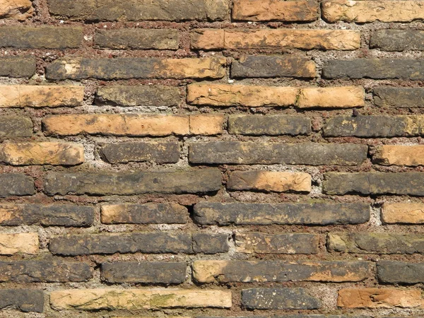 Ancient bricks wall — Stock Photo, Image