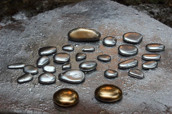 Gold pebbles — Stock Photo, Image