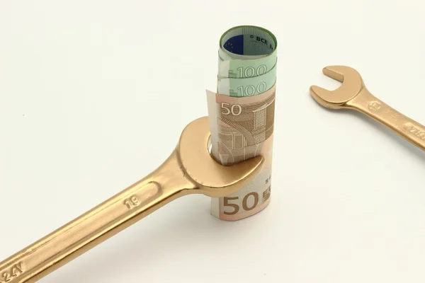 Kosten van arbeid - de gouden sleutel — Stockfoto