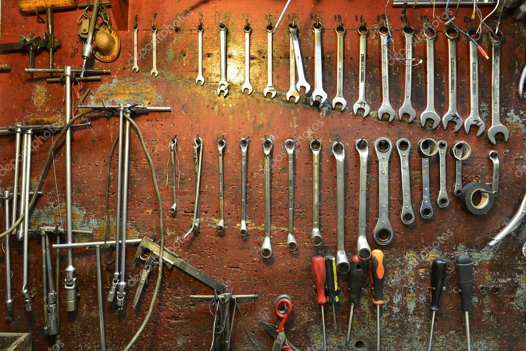 Tools of a mechanical on a wall Stock Photo by