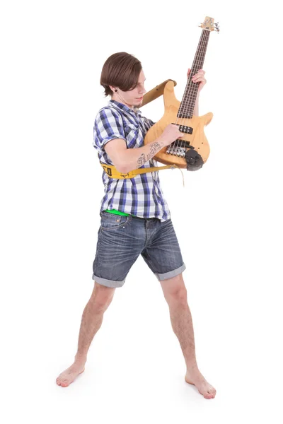 Young man with a bass guitar — Stock Photo, Image