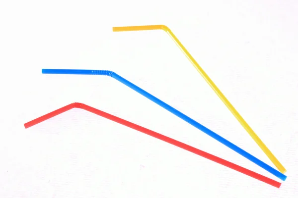 カクテル。白い背景の上の 3 つのカラフルなカクテル棒. ストック画像