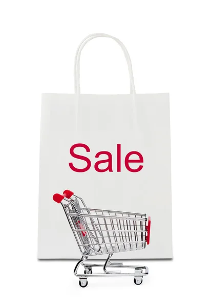 "Sale" on shopping bag with cart — Stock Photo, Image