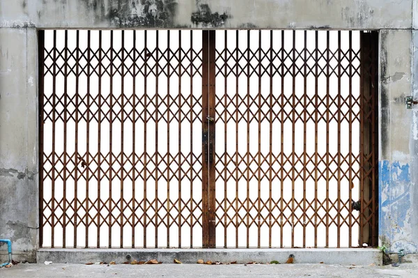 Antique Slide Steel Door Locked White Background — Stok fotoğraf