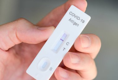 Rapid antigen test kit with negative result during swab covid-19 testing