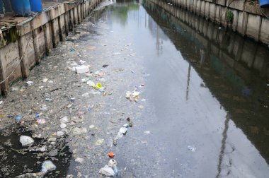 Garbage on waste water in canal