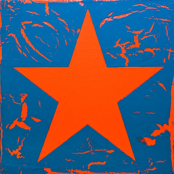Estrella de arte, imagen de pintura agrietada, estrella roja en la superficie azul — Foto de Stock