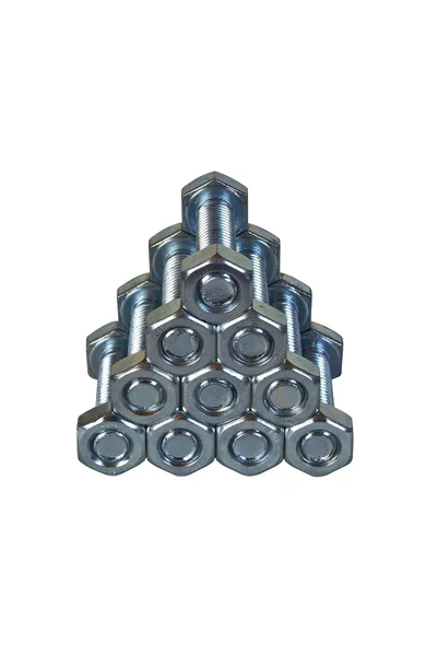 Pyramid of bolts and nuts Stock Photo