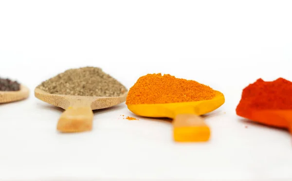 Indian Curry Powders Isolated Wooden Spoon Selective Focus Turmeric Powder — Stock Photo, Image