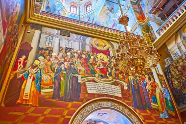 KYIV, UKRAINE - AUGUST 14, 2021: The fresco in Dormition Cathedral of Kyiv Pechersk Lavra Monastery, depicting the First Council of Nicaea, on Aug 14 in Kyiv clipart