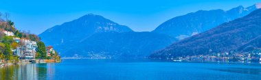 Lugano Gölü 'nün arka planda Lugano Prealps dağları, Morcote, İsviçre manzarası.